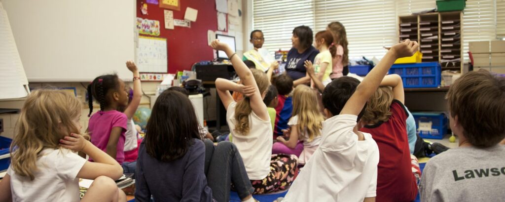 grand rapids elementary school with kids and teacher