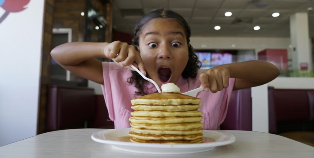 child eating pancakes in grand rapids