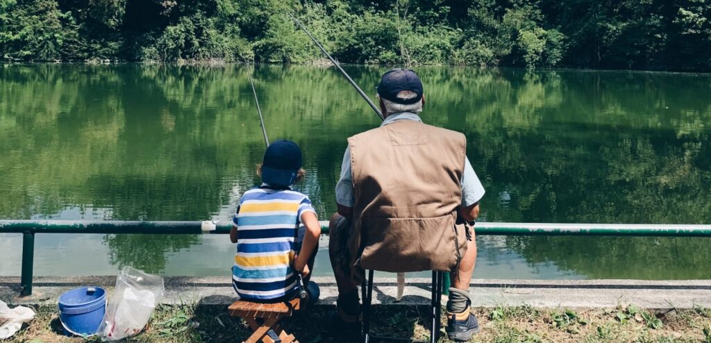 ionia state rec area small boy fishing with grandpa